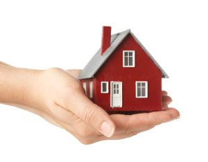 Hand holding house huisverhurenzaandam rent out now